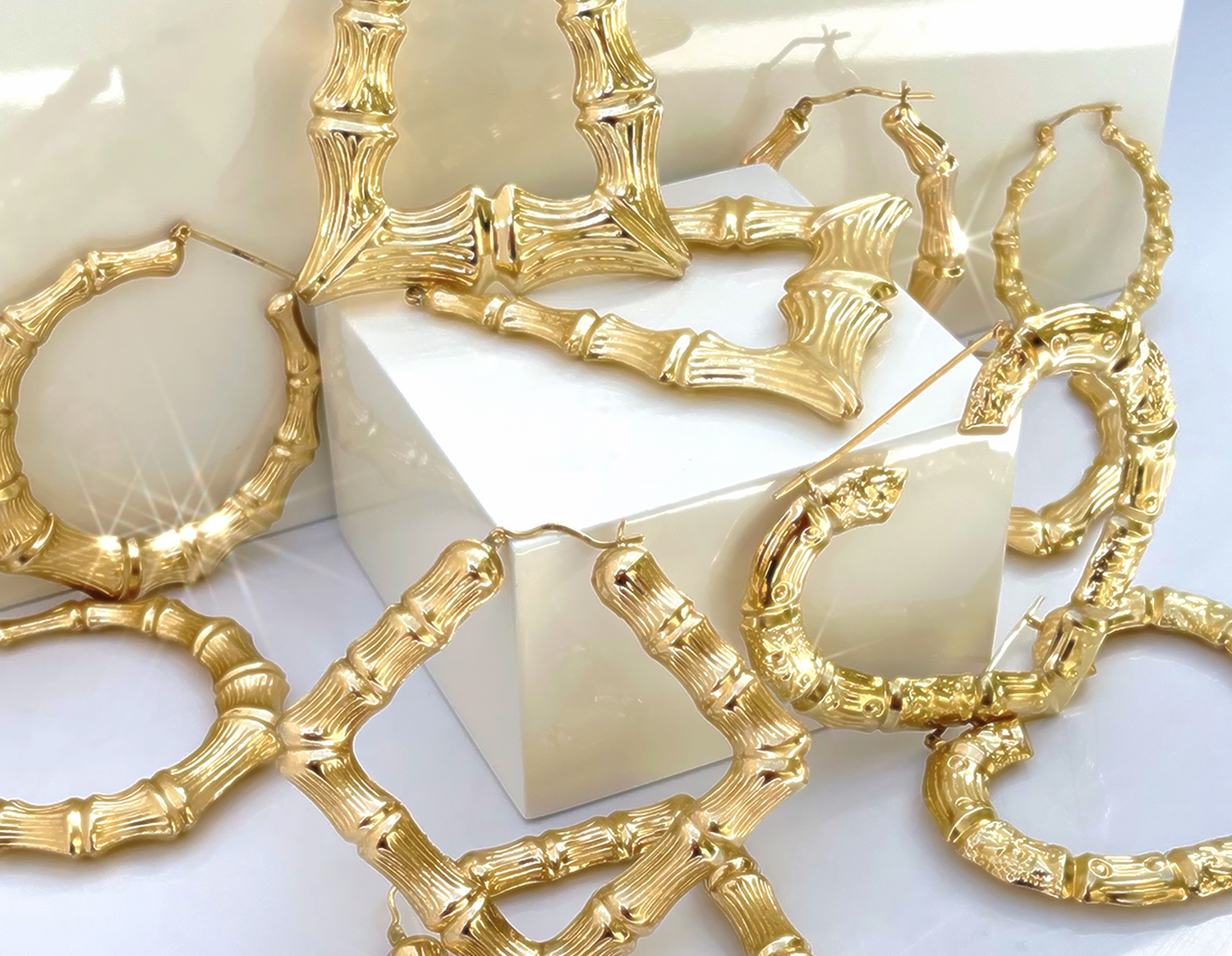 gold earrings, hoop earrings, bamboo earrings.