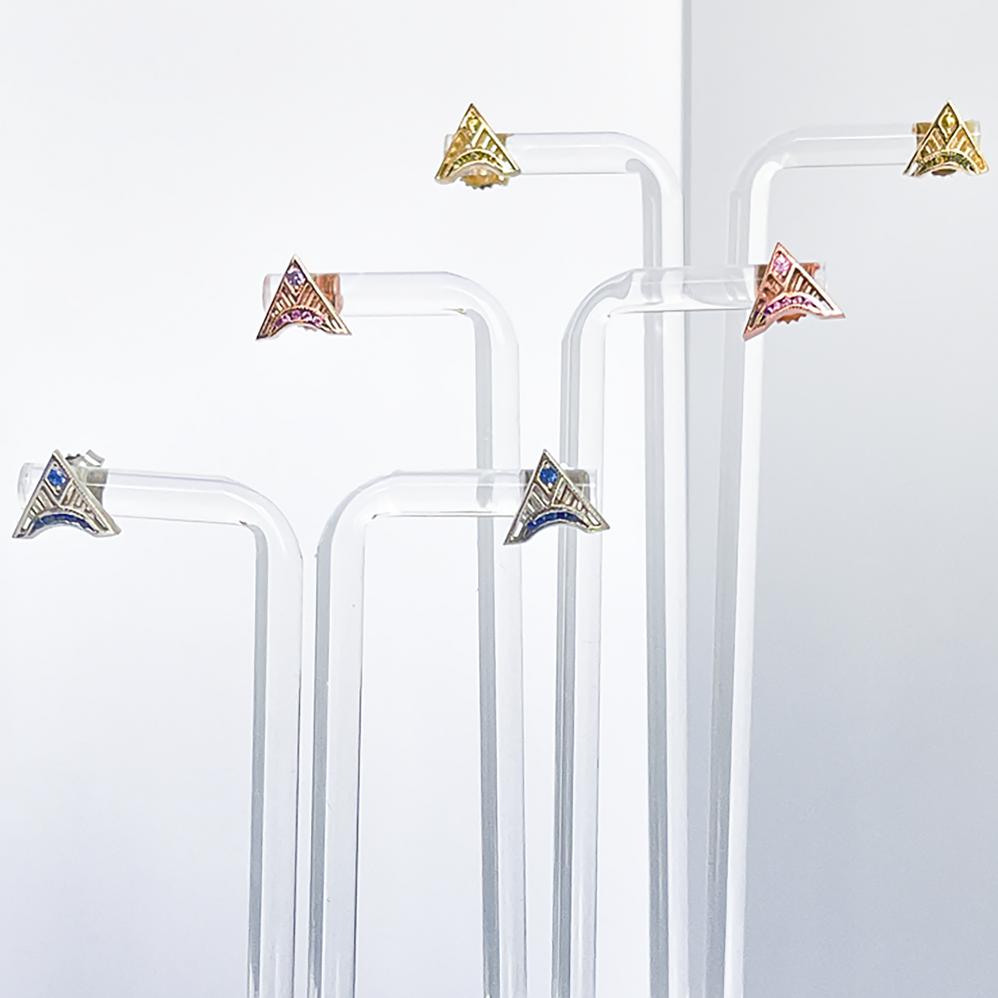 yellow gold/yellow sapphire, rose gold/ pink sapphire, white gold/ blue sapphire trinity triangle stud earring